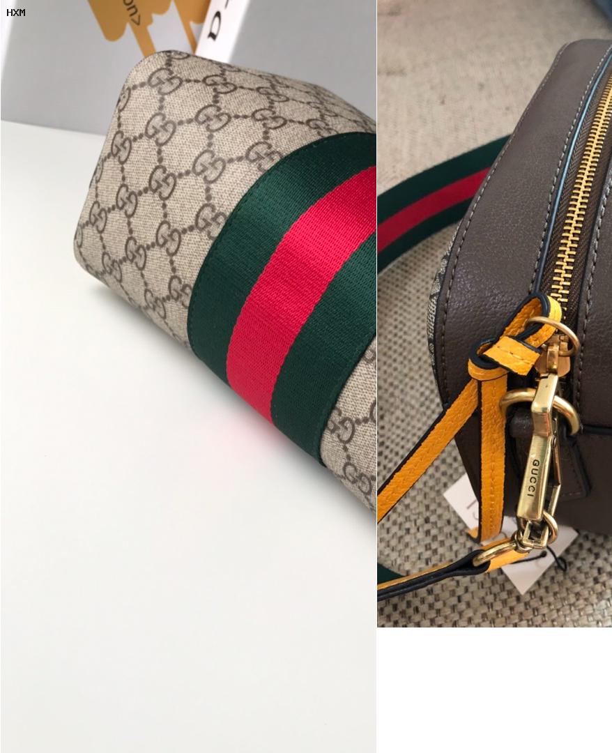 sac gucci avec papillon